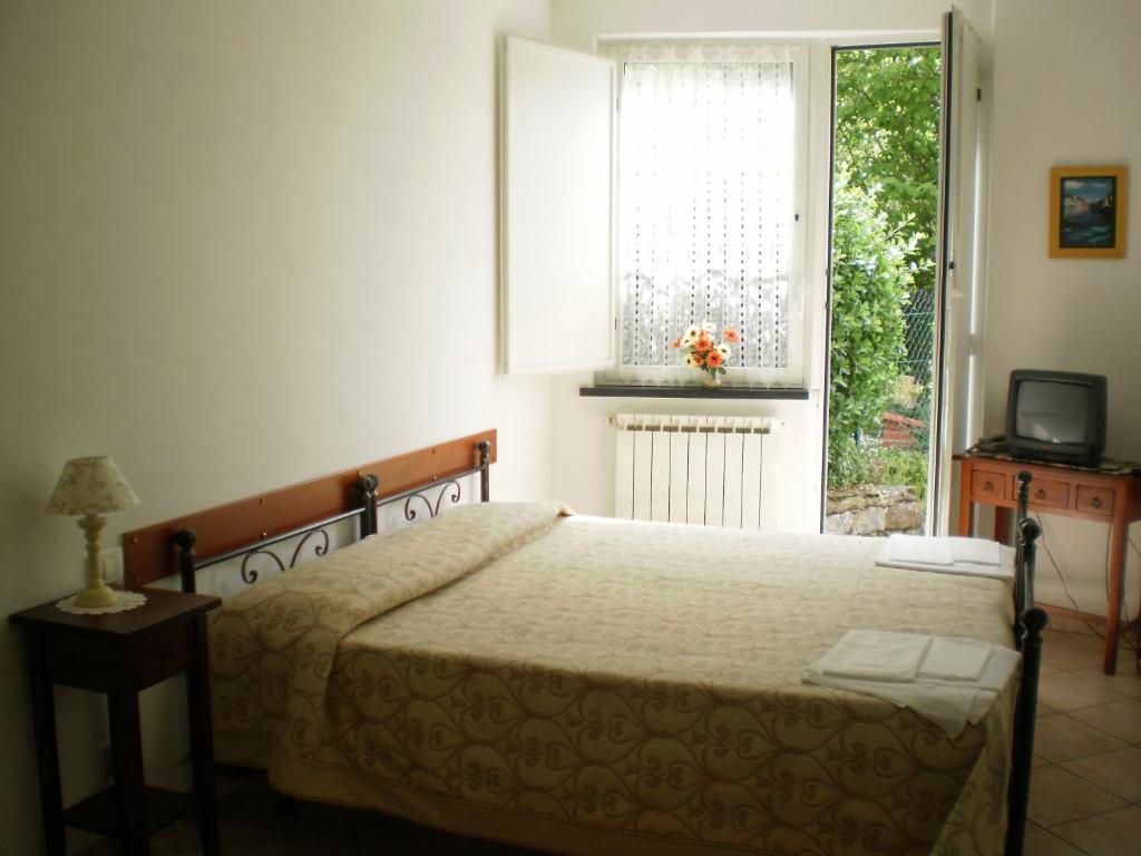 Hotel Paese Corvara Beverino Cameră foto
