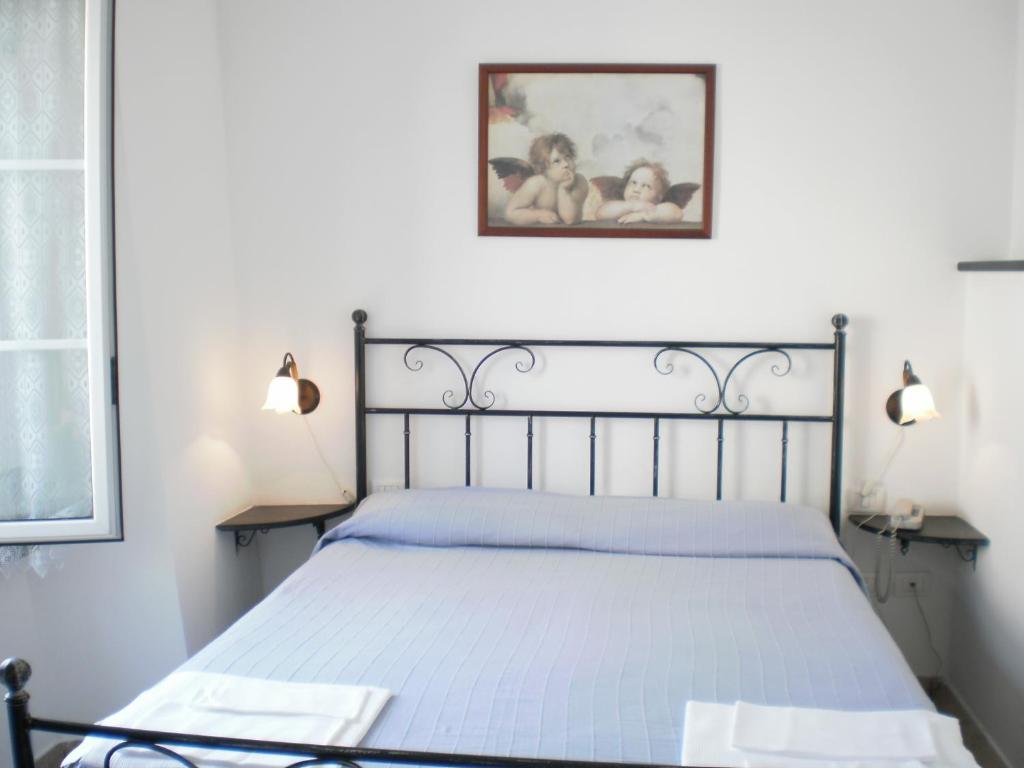 Hotel Paese Corvara Beverino Cameră foto